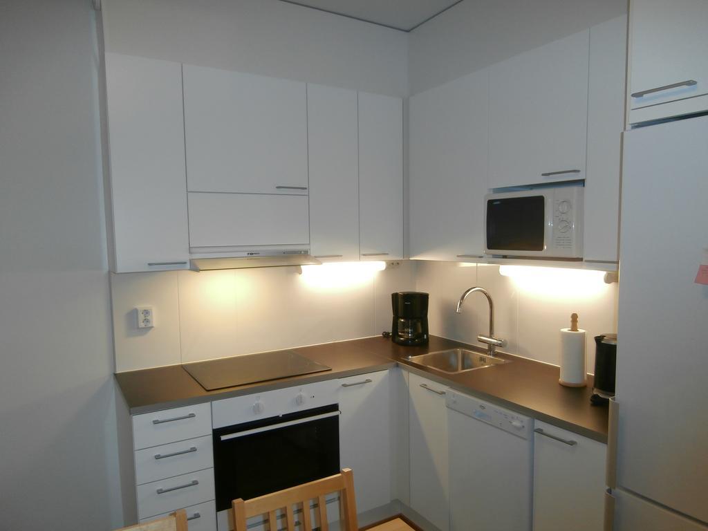 Apartment Nallisuites أولو الغرفة الصورة